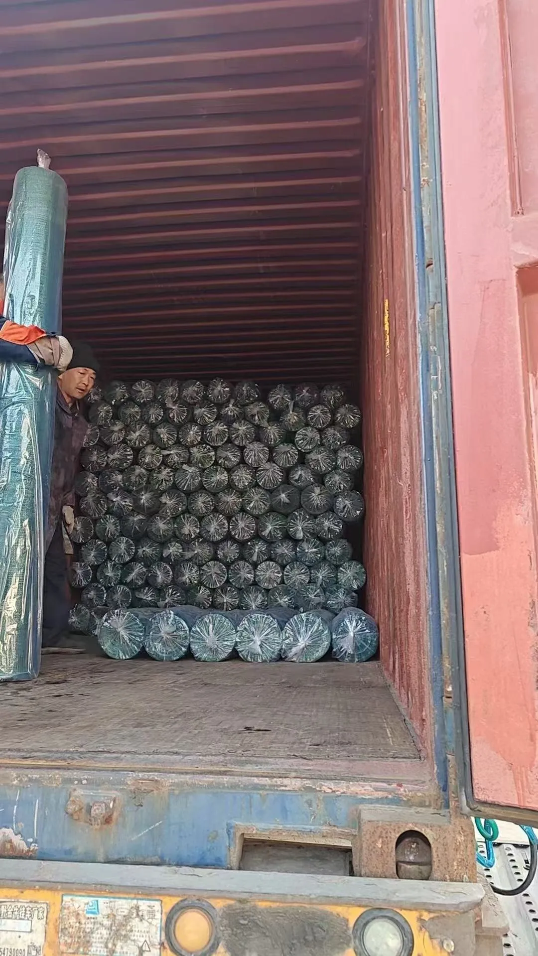 Carga de rollos Barbol en contenedor